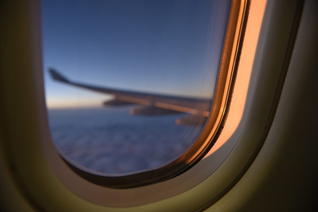 Aircraft wing as seen through window